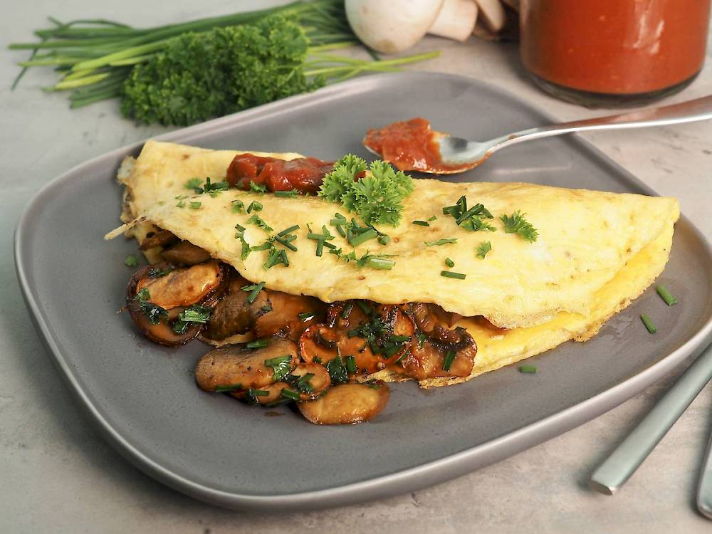 Picture of mushroom omellette with ketchup